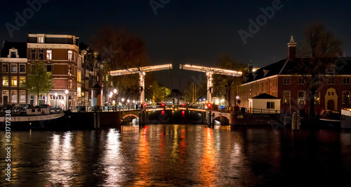 Night Shot of Walter S  skinbrug where the Nieuwe Herengracht Canal Meets the Amstel River  Amsterdam  Holland