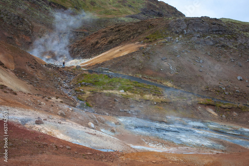 Krýsuvík, popular with hikers, this area features geothermal fields, hot springs & yellow, green & red soil.