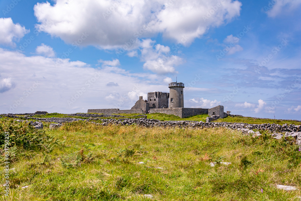 Stone ruins of the castle and lighthouse at Inishmore island, Galway