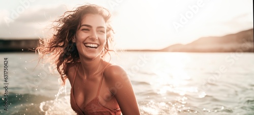 beautiful smiling woman with long hair enjoying sea at summer 