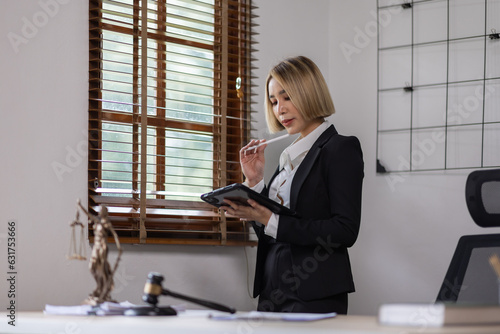 Happy smiling ceo manager Female judge in a courtroom at office space, possibly real estate, lawyer, non-profit, marketing Justice and law concept. Free Download Happy smiling ceo manager Female judge in a courtroom at office space, possibly real estate, lawyer, non-profit, marketing Justice and law concept. - GFXLoad