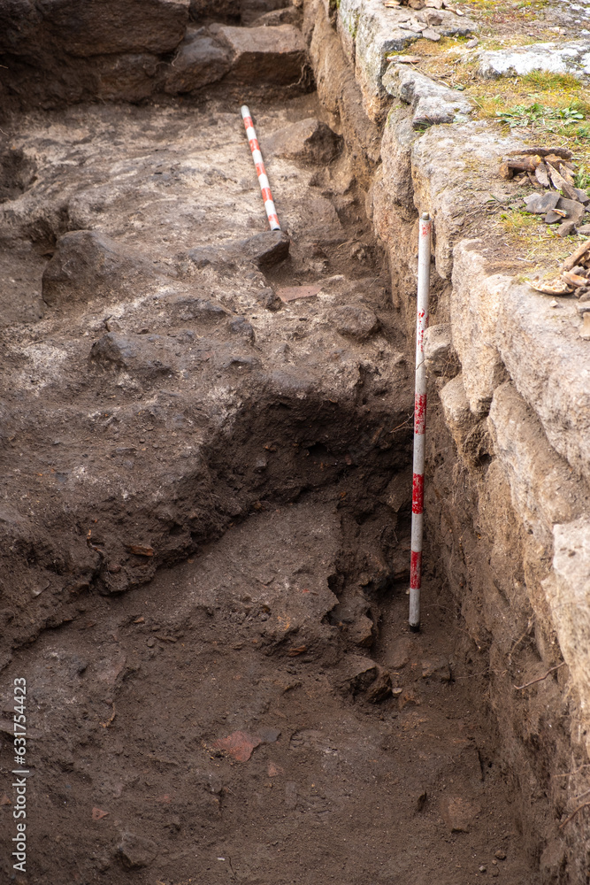 detail of a trench in an archaeological dig detail of a trench in an archaeological dig