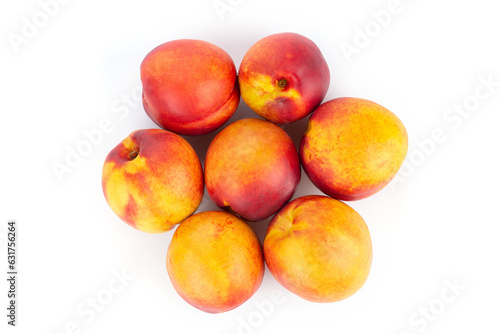 Fresh nectarines fruits isolated on white background. Ripe peach top view.