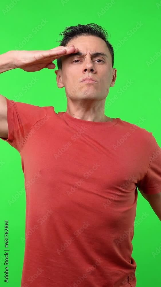 Man doing the military salute. Medium shot. Man doing the military salute. Medium shot.