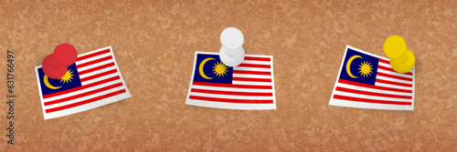 Malaysia flag pinned in cork board, three versions of Malaysia flag.
