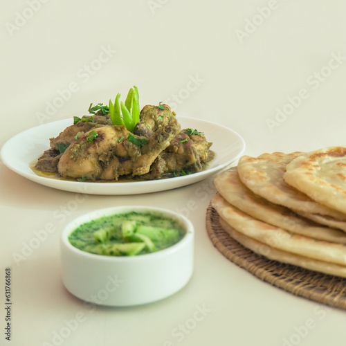 Fresh homemade Chicken Roust with delicious Parotta photo