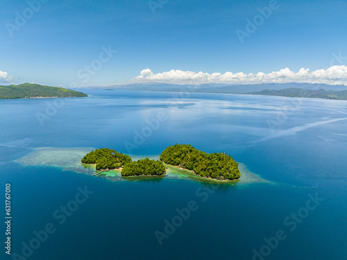 Beautiful tropical island and blue sea. Bangkay Island. Mindanao, Philippines.