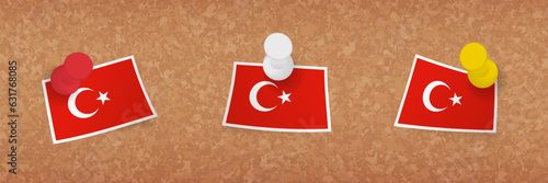 Turkey flag pinned in cork board, three versions of Turkey flag.