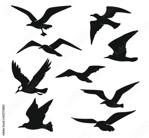 Black Silhouette of birds flying swallow dove isolated on white background © Design Stock