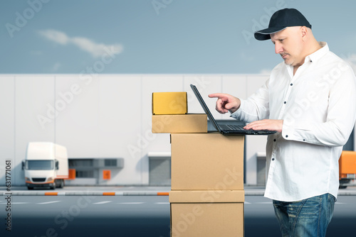 Businessman with boxes. Bus...