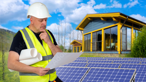Man near solar panels. Ener...