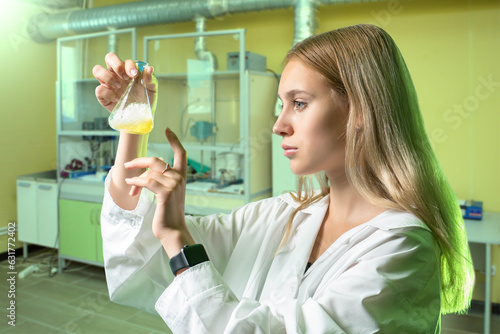 Woman chemist. Student in l...