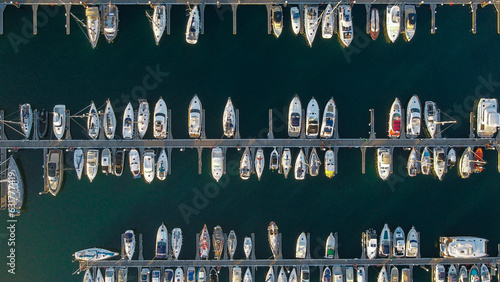 Aerial view over boats in a marina. Portugal, 2023
