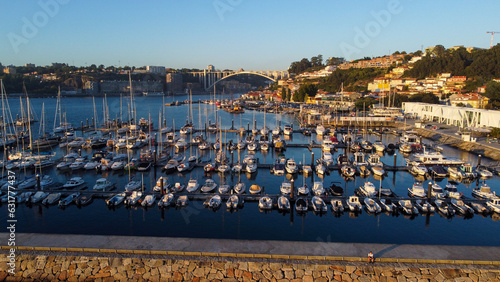 Aerial view over Afurada, with the Arrábida bridge in the background. Vila Nova de Gaia/Porto, Portugal, 2023.