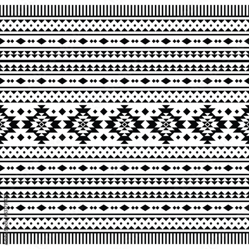 Seamless ethnic pattern style of Navajo tribal with geometric shapes. Native American motifs design for textile and fabric print. Black and white colors.