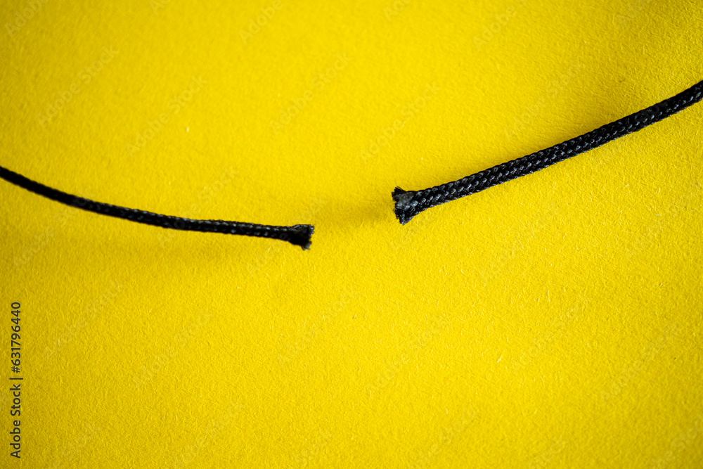Close up of a Broken Rope. Discontinuity, Betrayal, Divorce, Separation Concept Image. Close up of a Broken Rope. Discontinuity, Betrayal, Divorce, Separation Concept Image.