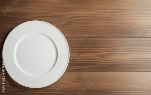 white plate seen from above on wooden table