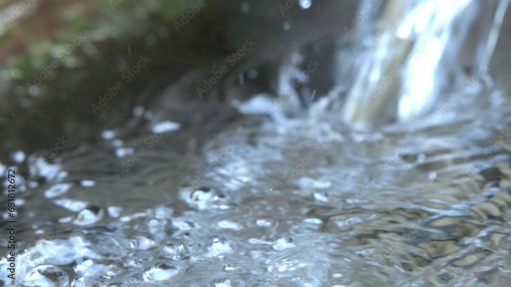 beautiful natural ecological spring water stream. 4k macro footage beautiful natural ecological spring water stream. 4k macro footage