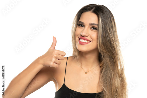 Wallpaper Mural beautiful young happy women with makeup and long hair showing thumb up on a white background. Torontodigital.ca