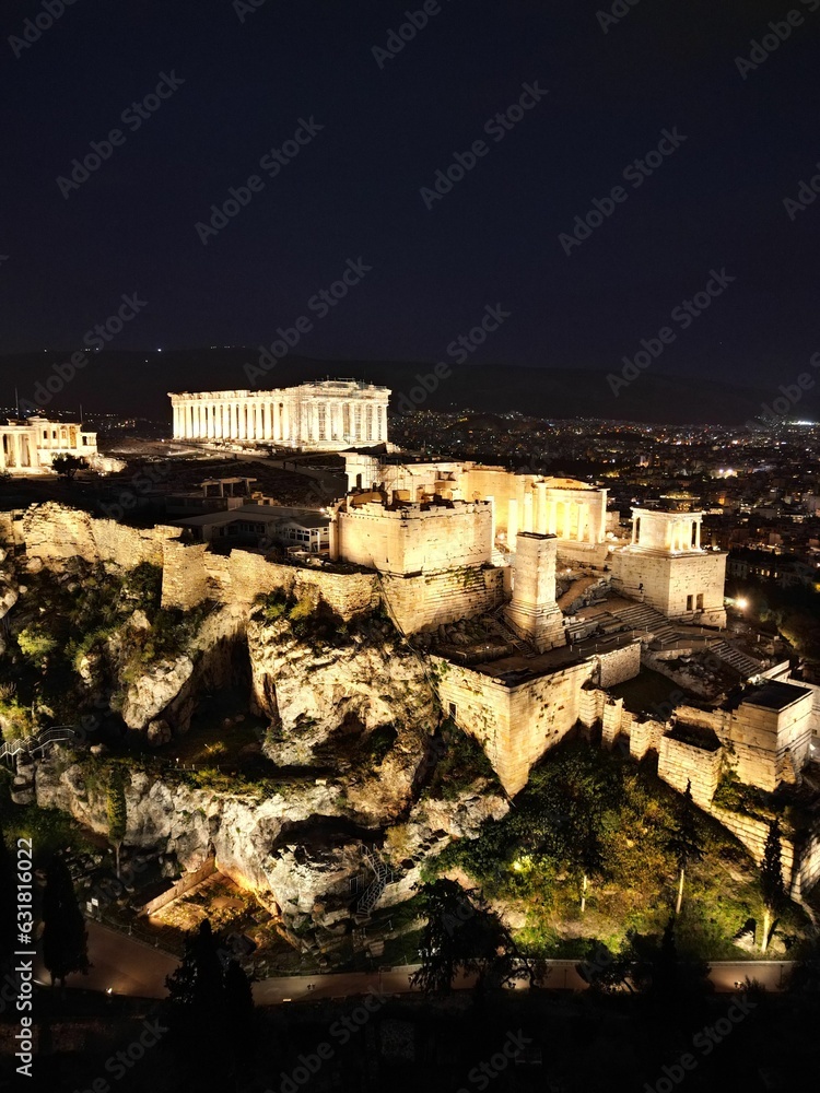Aerial view of the illuminated Acropolis of Athens at night. Greece.