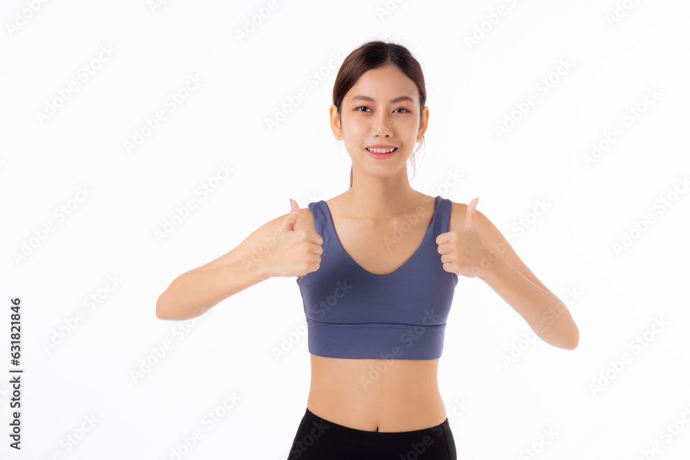 Portrait beautiful young asian woman in sportwear smile and thumbs up isolated on white background, sport and training exercise for health, female fitness workout for slimming and confident. Portrait beautiful young asian woman in sportwear smile and thumbs up isolated on white background, sport and training exercise for health, female fitness workout for slimming and confident.