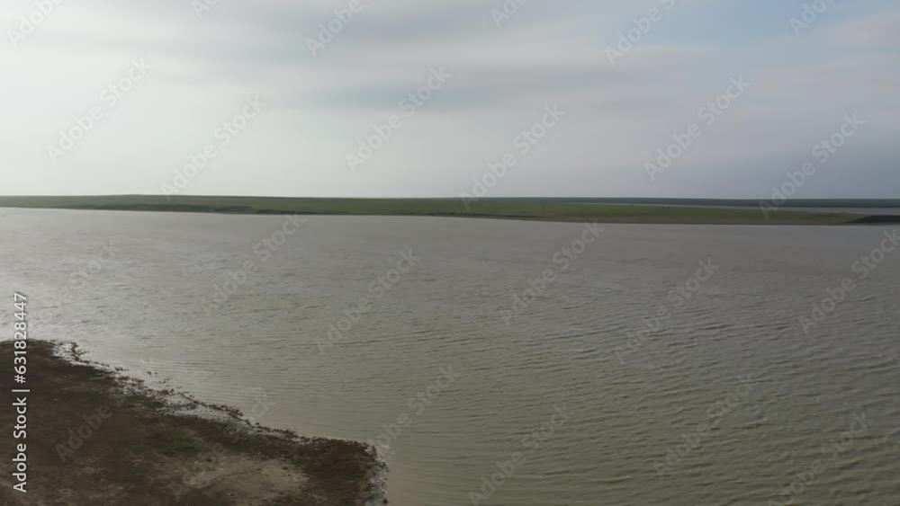 Curlew Pelicans in flight. Flying with the wild birds. A majestic large bird in flight. Calm flight of a pelican to fishing. Slow motion video Curlew Pelicans in flight. Flying with the wild birds. A majestic large bird in flight. Calm flight of a pelican to fishing. Slow motion video