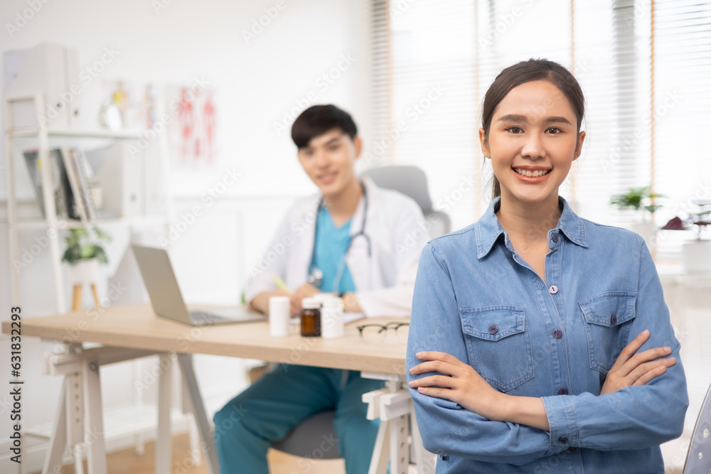 Happy healthy young  asian woman patient visiting old male doctor, portrait.