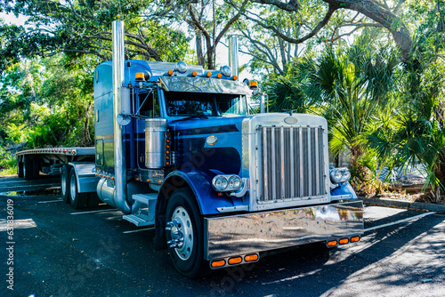 semi truck in america. freightliner trailer transportation. rig truck semi trailer hauling. American style truck. Transport concept. Road freight cars. trucking with semitruck vehicle. front view