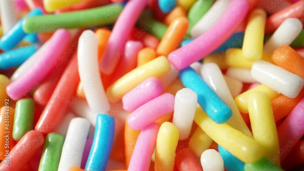 In a mesmerizing macro video, sugar sprinkles cascade like a vibrant rainbow of blues. The enchanting colors blend and dance, revealing intricate textures and sparkling reflections.
In a mesmerizing macro video, sugar sprinkles cascade like a vibrant rainbow of blues. The enchanting colors blend and dance, revealing intricate textures and sparkling reflections.