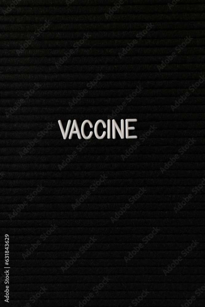 Vertical black spongy board with a text Vertical black spongy board with a text