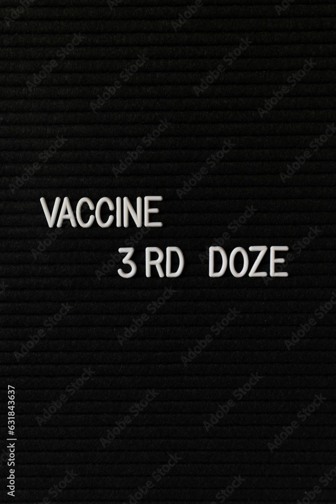 Vertical background about Covid-19 with white text on a black backdrop Vertical background about Covid-19 with white text on a black backdrop