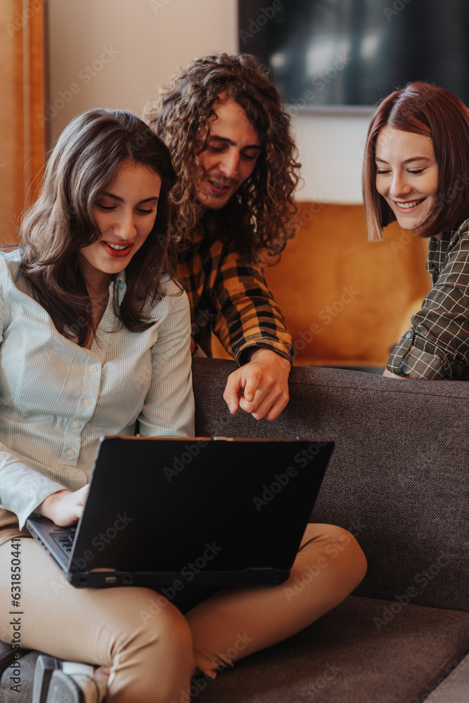 Group of software developers working as team at the office in a good atmosphere Group of software developers working as team at the office in a good atmosphere