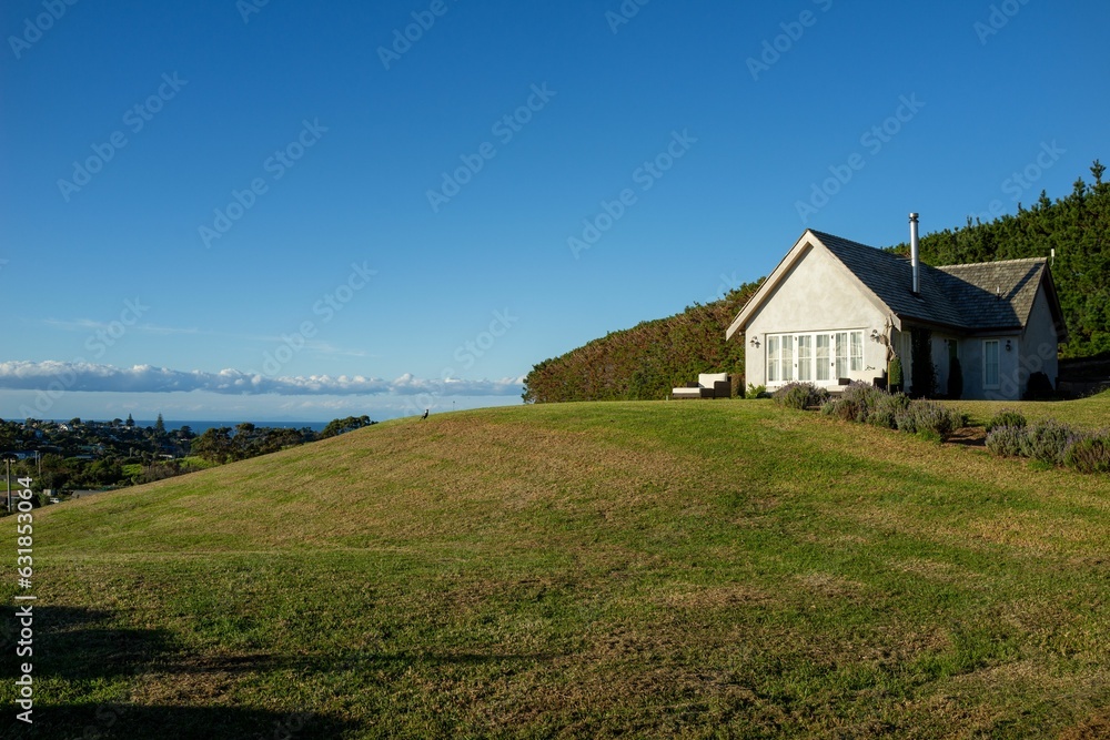Charming, traditional-style single-family home on a hill in New Zealand. Charming, traditional-style single-family home on a hill in New Zealand.