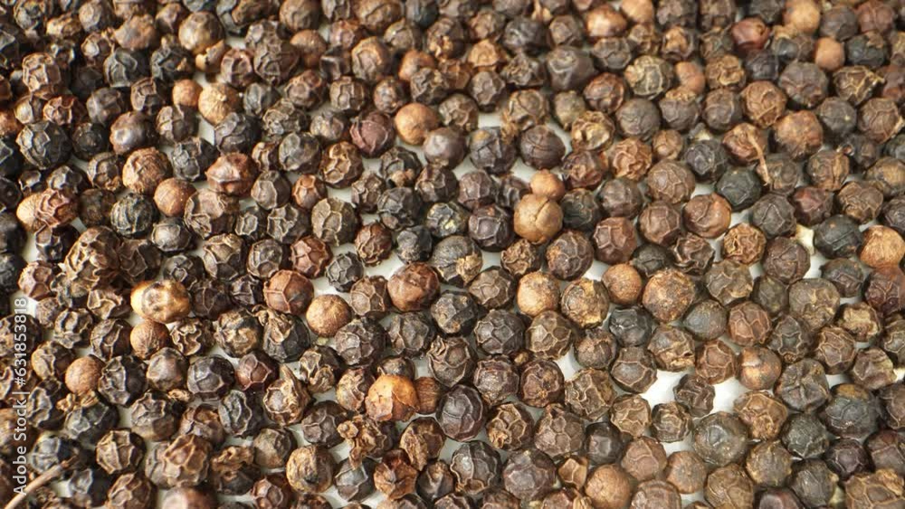 Black pepper through a mesmerizing macro video. A probing lens delves into its textured surface, revealing a universe of tiny bumps and crevices, showcasing the spice's hidden beauty.
Black pepper through a mesmerizing macro video. A probing lens delves into its textured surface, revealing a universe of tiny bumps and crevices, showcasing the spice's hidden beauty.