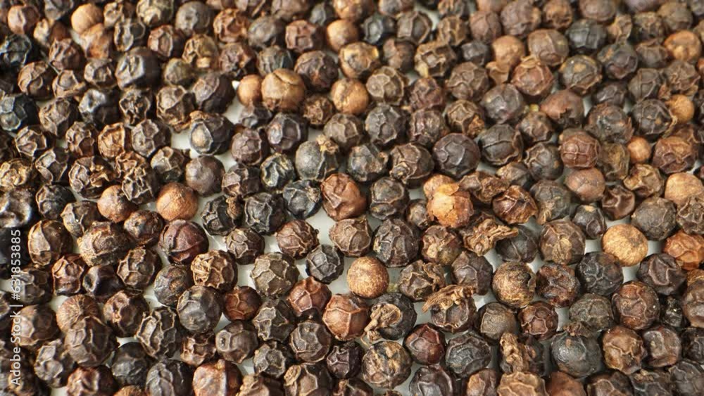 Black pepper in macro detail. Revealing a universe of tiny ridges and ...