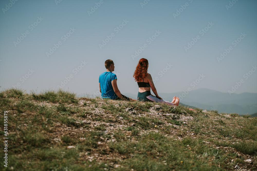 Fototapeta premium Sitting at the top of the meadow