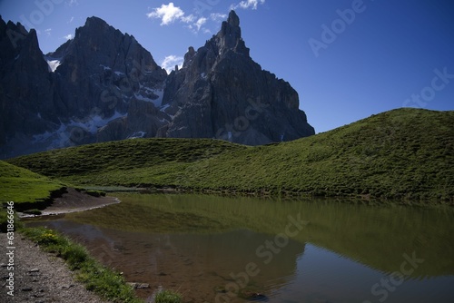 Fototapeta Naklejka Na Ścianę i Meble -  Landscape of the Dolomites under a blue sky in the Pala group in Italy
