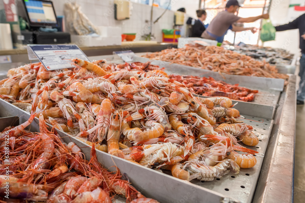 Shrimps and seafood for sale in the Olhao market. Shrimps and seafood for sale in the Olhao market.