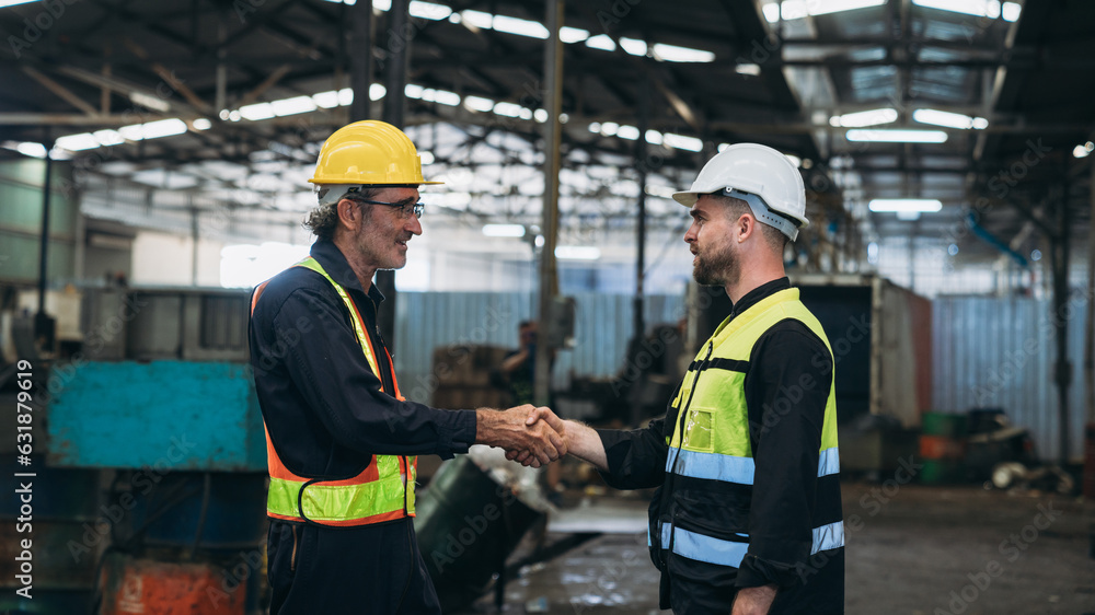 Team Engineer is shaking hands. Industrial worker in the factory. Engineer is maintaining in the warehouse. Team Engineer is shaking hands. Industrial worker in the factory. Engineer is maintaining in the warehouse.