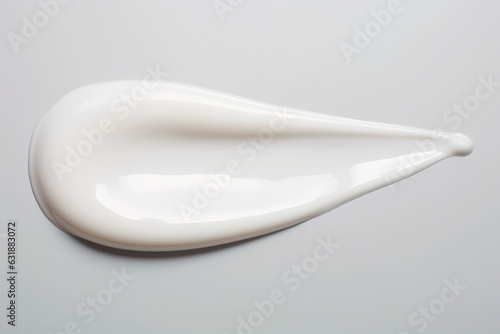 Textured white color cream gel cosmetic smudge on white background, paint or nail polish smudge