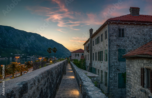Evening view of the old town of Kotor, Montenegro from the fortress wall. The Bay of Kotor is a beautiful place on the Adriatic Sea. Kotor, Montenegro. © Tryfonov