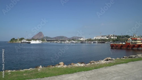 View of Pão de Açúcar hill and Marina da Glória from Aterro do Flamengo, in the gardens of Roberto Burle Marx, in front of the Museum of Modern Art of Rio de Janeiro. photo