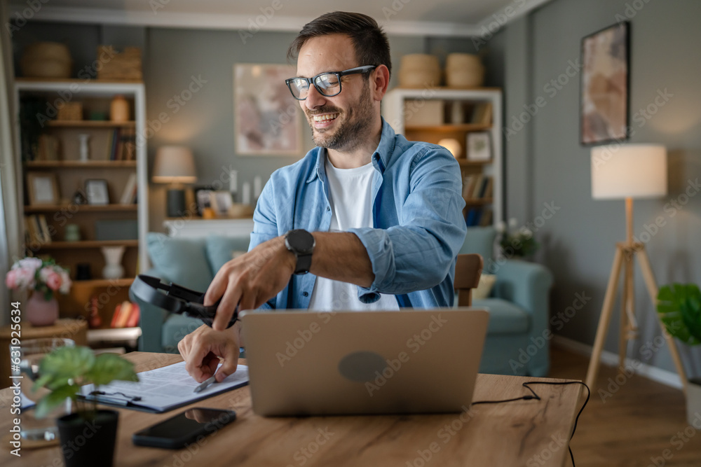One man caucasian male freelancer work from home on laptop computer One man caucasian male freelancer work from home on laptop computer