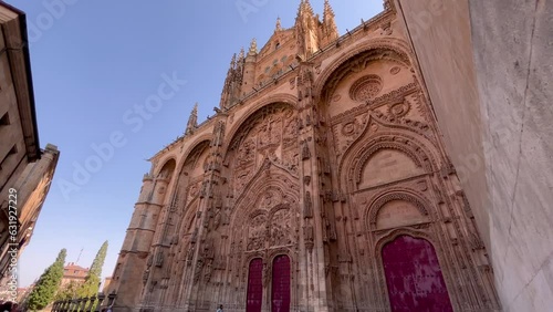 Unveiling video footage of Salamanca Cathedral - Catedral Vieja. Slow motion unveiling video of Salamanca Cathedral entrance. Slow motion unveiling video of Cathedral with beautiful architectural deta photo