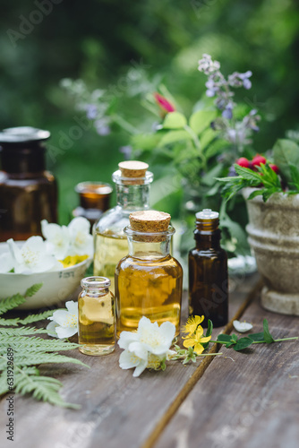 Natural beauty cosmetic skincare homemade products with pure essential oils  herbal extracts. Concept of organic ingredients in cosmetology  dermatology  body care treatment  massage