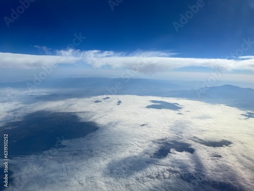Aerial view of indigo blue skies and low clouds over the Santa Ana Mountains in southern California © vesperstock