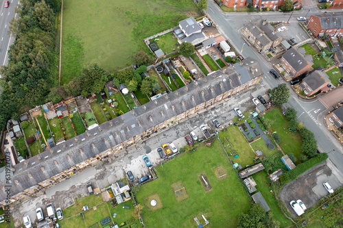 Aerial photo of the village of East Ardsley in the City of Leeds metropolitan borough, in West Yorkshire England showing typical British housing estate and rows of terrace houses in the summer photo