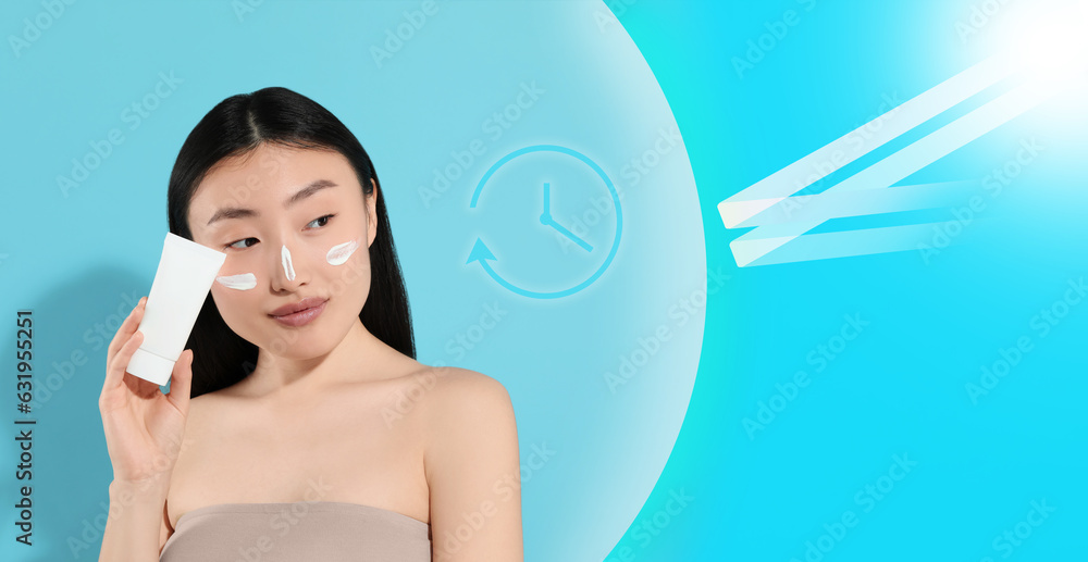 Sun protection product as barrier against ultraviolet, banner design. Beautiful young woman with sunscreen against light blue background Sun protection product as barrier against ultraviolet, banner design. Beautiful young woman with sunscreen against light blue background