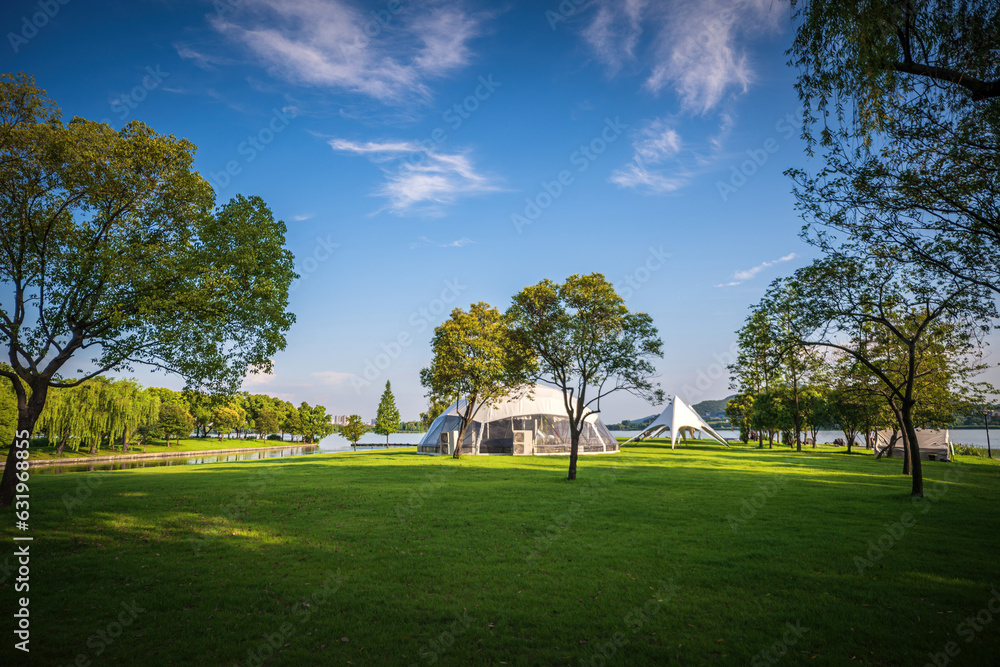 Fototapeta premium Camping tent on the grass in a sunny day