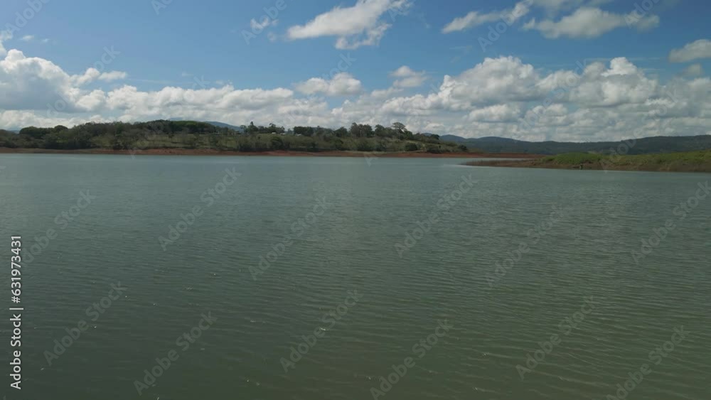 Low Drone Flyover Water Surface Of Arenal Lagoon Costa Rica On Sunny Day, 4K Low Drone Flyover Water Surface Of Arenal Lagoon Costa Rica On Sunny Day, 4K